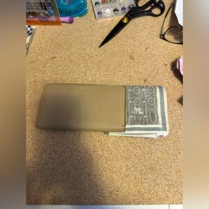 Celine wallet and scarf normal wear. Very pretty.